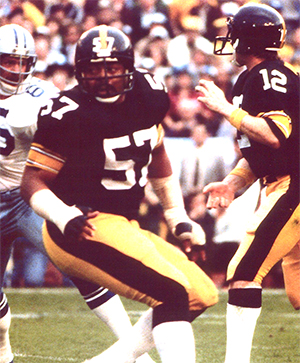 John Stallworth of the Pittsburgh Steelers is tackled by Vernon